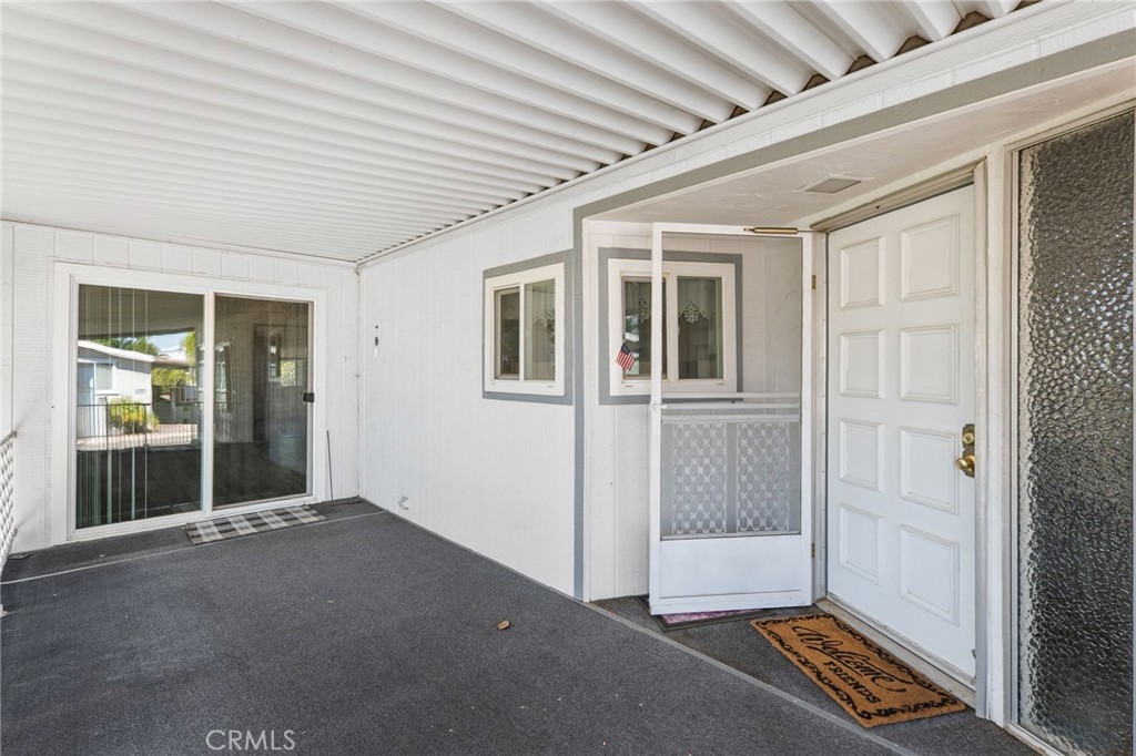 27701 Murrieta Road, Unit 227 Menifee, CA 92586 - Photo 4 of 36 an empty room with windows