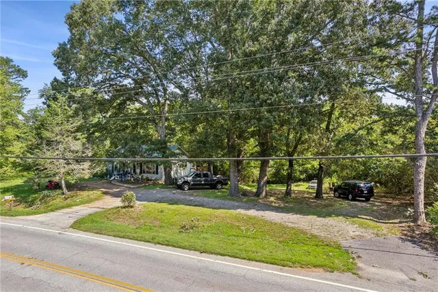 a view of yard with car parked