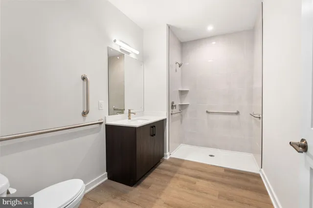 a view of a kitchen with a washer and dryer
