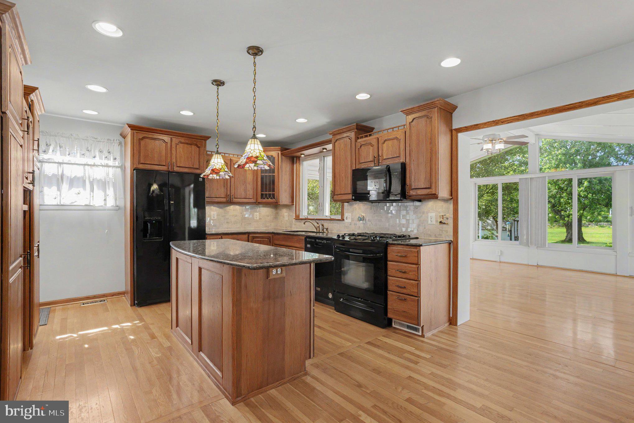 9618 Dundawan Road Nottingham, MD 21236 - Photo 8 of 39 Kitchen opens to large family room