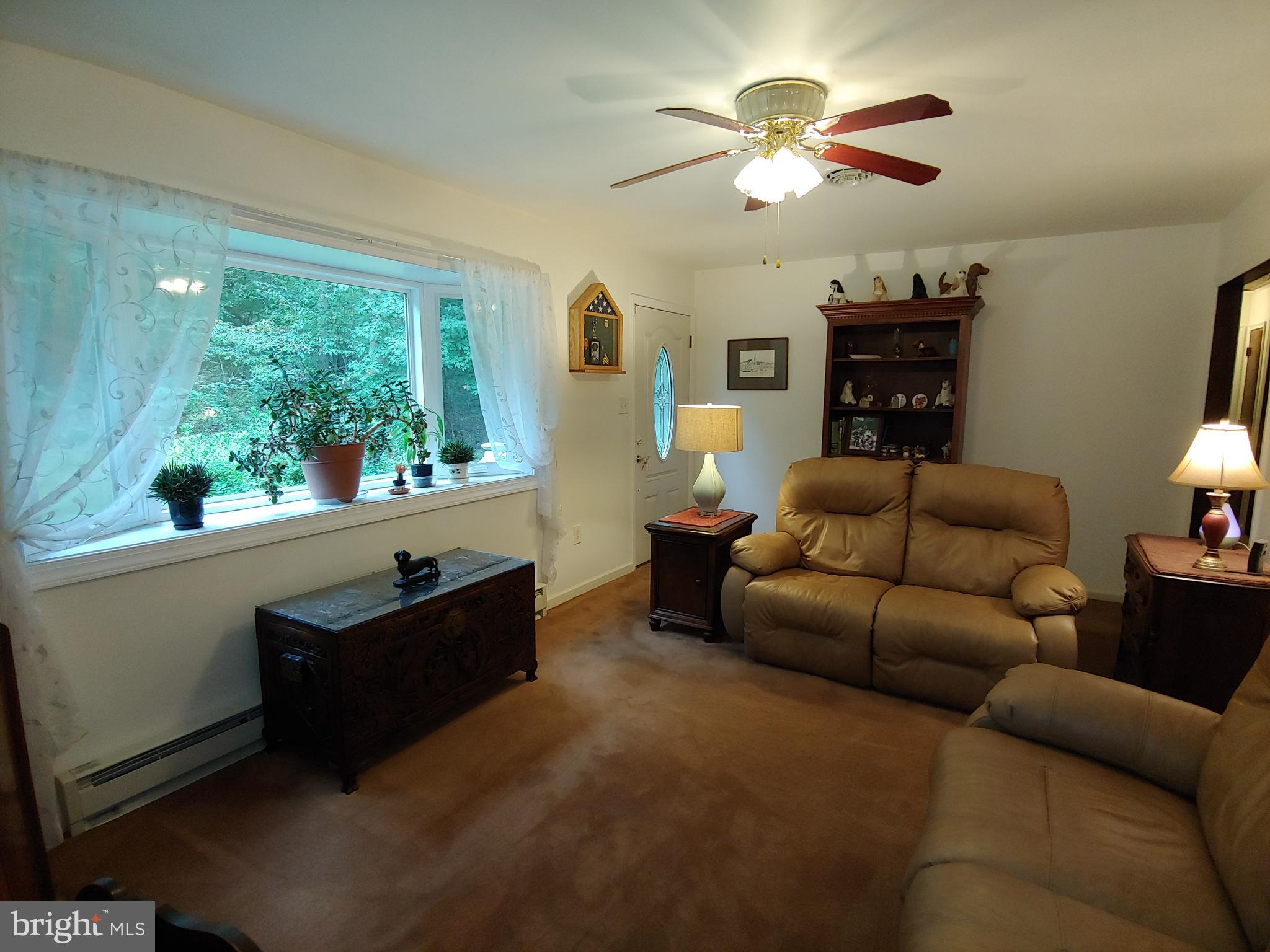 1629 Old Elk Neck Road Elkton, MD 21921 - Photo 7 of 36 Living room w bow window to watch nature