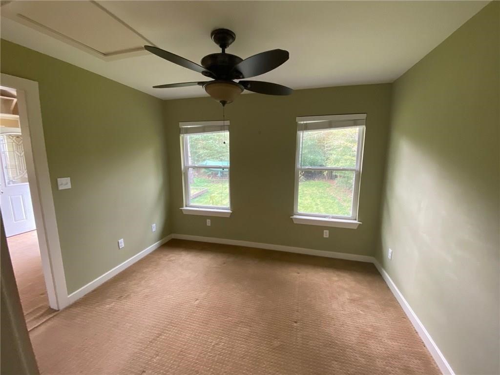 3308 Randolph Road, Unit B Austin, TX 78722 - Photo 12 of 16 a view of an empty room with a window