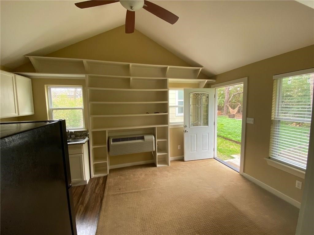 3308 Randolph Road, Unit B Austin, TX 78722 - Photo 8 of 16 a view of an empty room with a window
