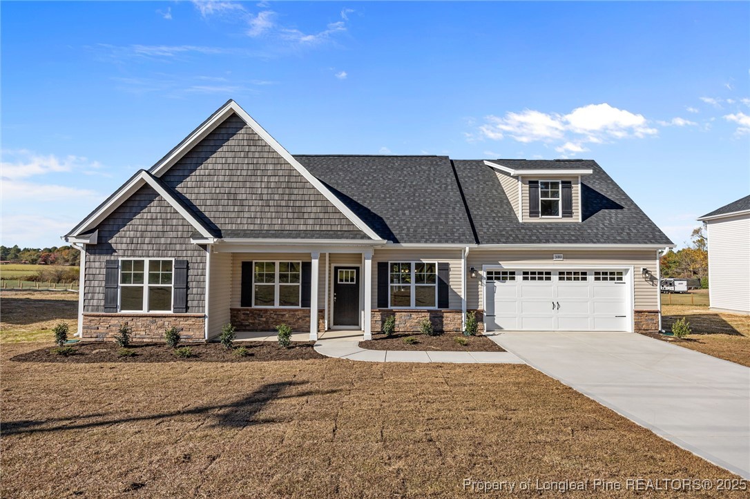 front view of a house with yard