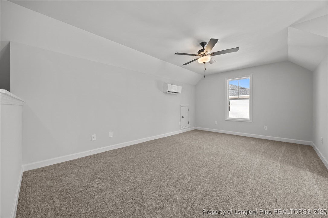 3180 Cameron Hill Road Cameron, NC 28326 - Photo 20 of 46 an empty room with a window and a ceiling fan