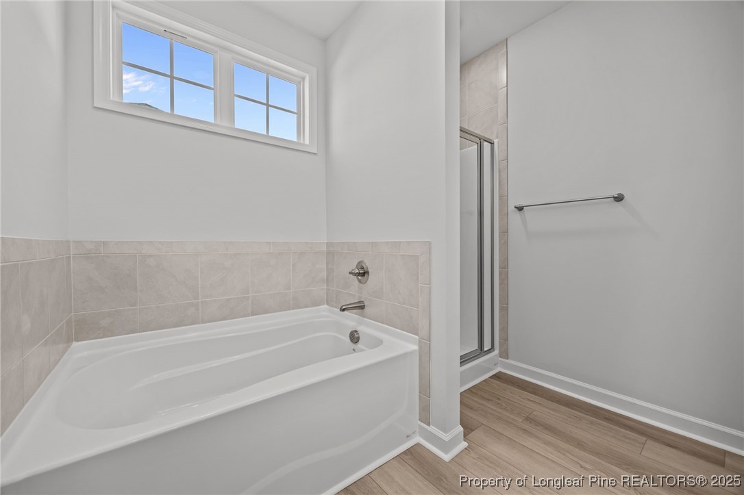 3180 Cameron Hill Road Cameron, NC 28326 - Photo 26 of 46 a white bath tub sitting next to a window