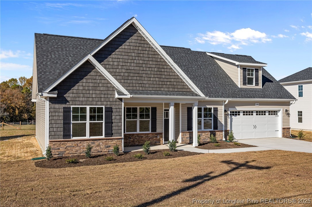 3180 Cameron Hill Road Cameron, NC 28326 - Photo 3 of 46 a front view of a house with a yard outdoor seating and barbeque oven