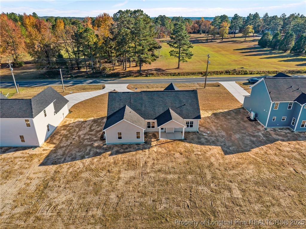 3180 Cameron Hill Road Cameron, NC 28326 - Photo 41 of 46 a view of a lake with a patio