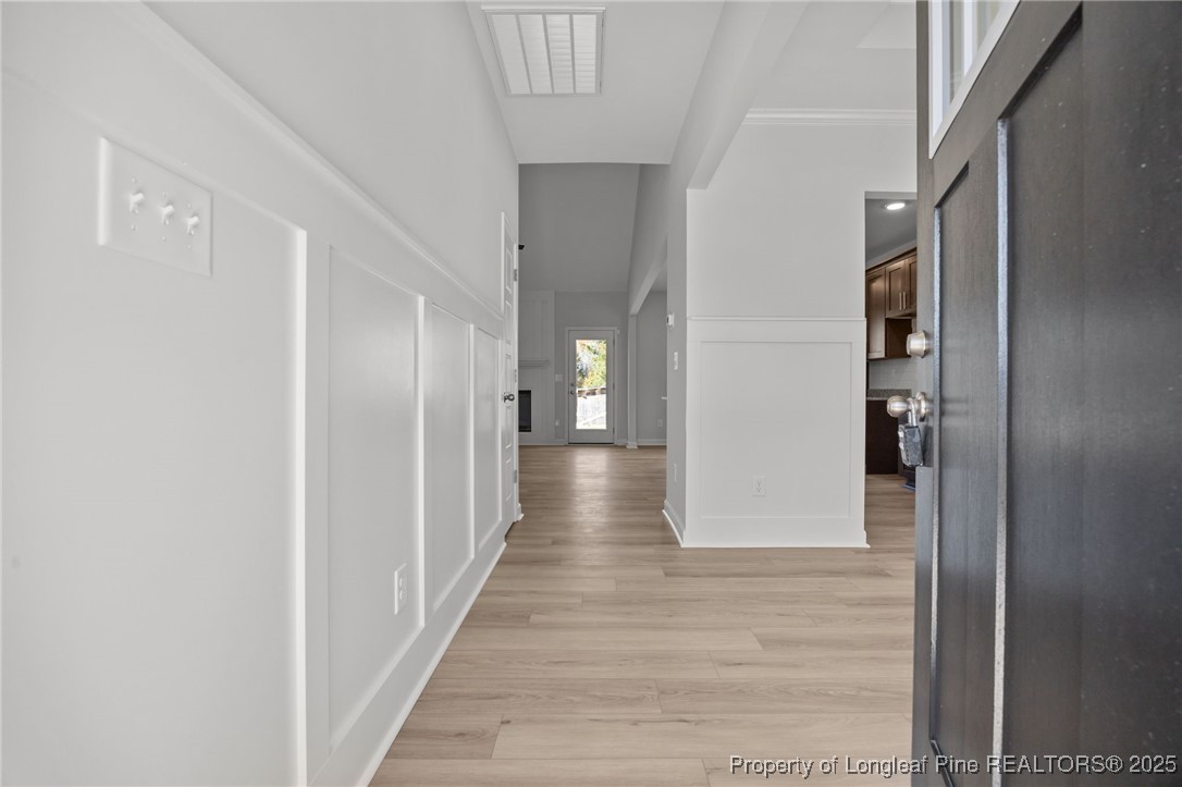3180 Cameron Hill Road Cameron, NC 28326 - Photo 6 of 46 a view of hallway with wooden floor