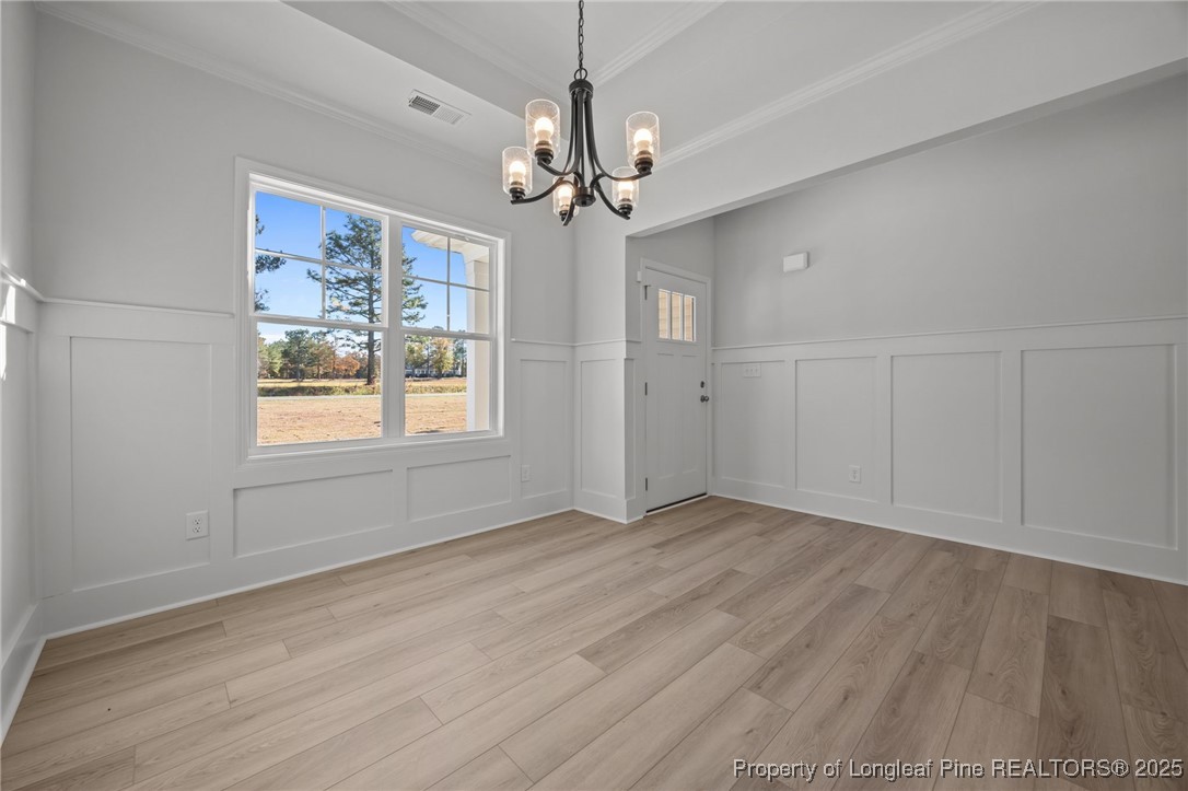 3180 Cameron Hill Road Cameron, NC 28326 - Photo 10 of 46 a view of an empty room with window and chandelier fan