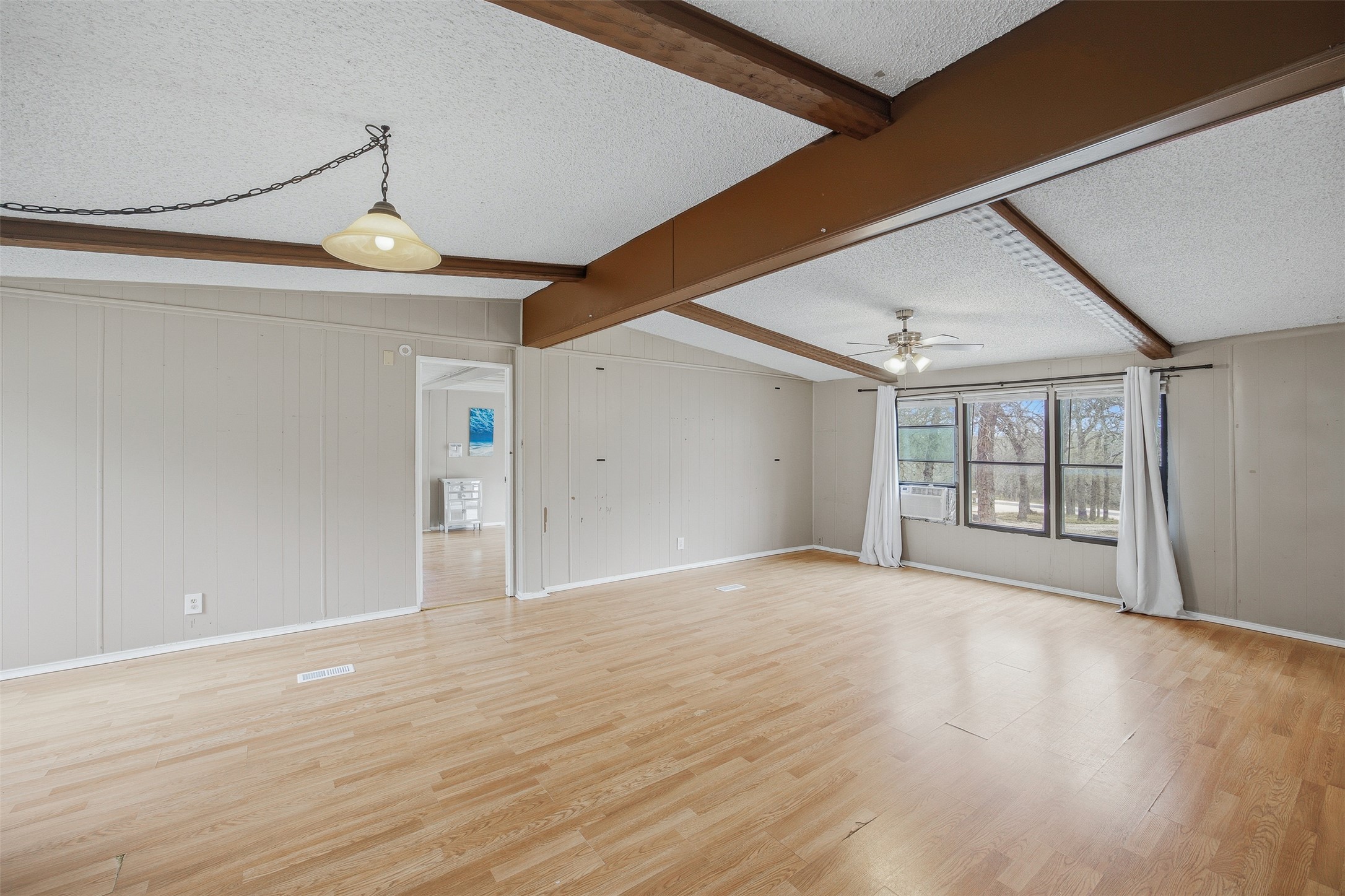 840 Oak Tree Road Seguin, TX 78155 - Photo 14 of 37 a view of empty room with wooden floor and fan