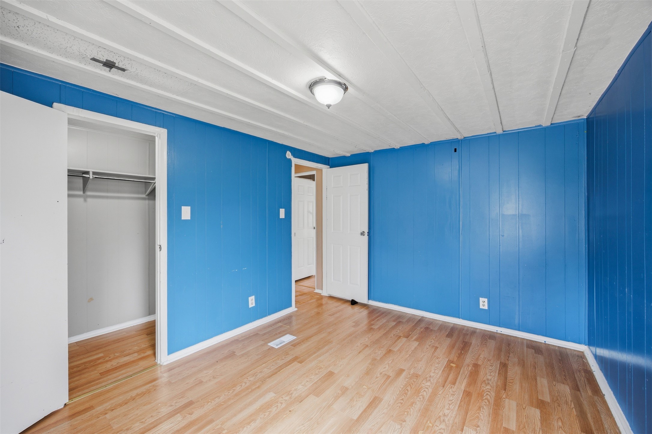 840 Oak Tree Road Seguin, TX 78155 - Photo 22 of 37 a view of an empty room with wooden floor