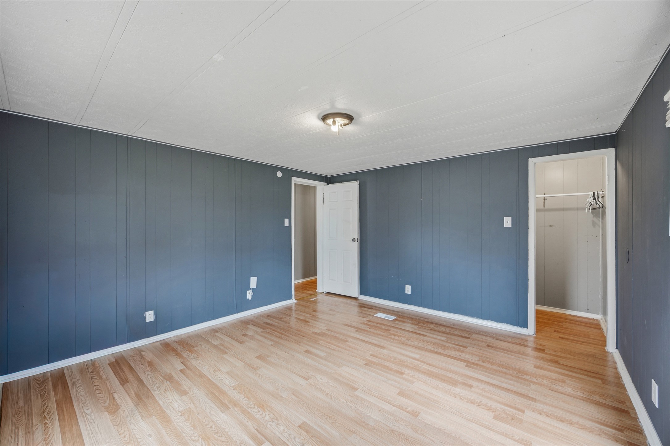 840 Oak Tree Road Seguin, TX 78155 - Photo 24 of 37 a view of an empty room with wooden floor