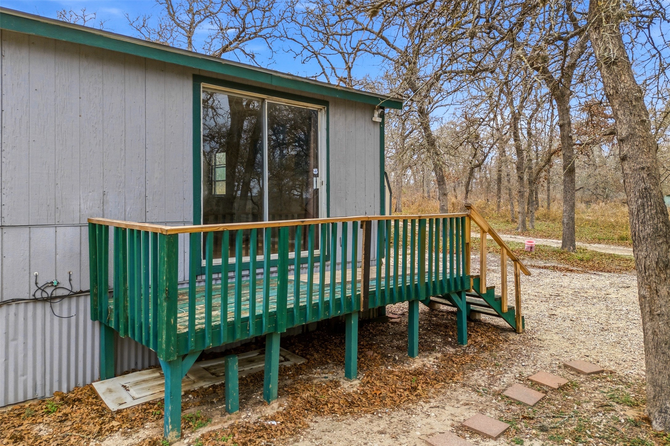 840 Oak Tree Road Seguin, TX 78155 - Photo 4 of 37 a view of a chair and table in the back yard