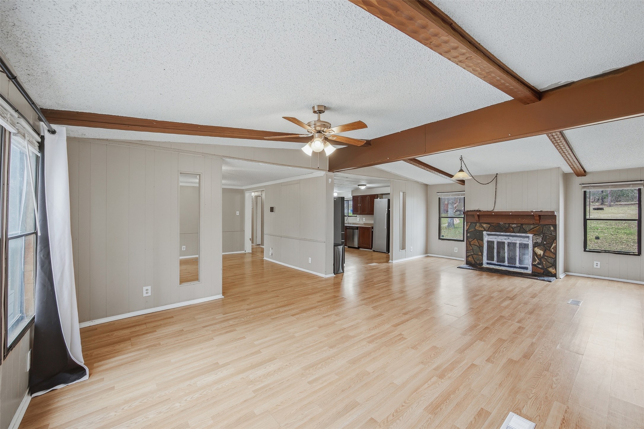 840 Oak Tree Road Seguin, TX 78155 - Photo 9 of 37 wooden floor in an empty room with a window