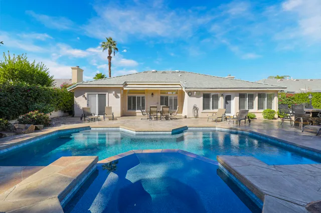 a aerial view of a house with a garden