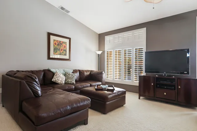 a kitchen with cabinets and white appliances