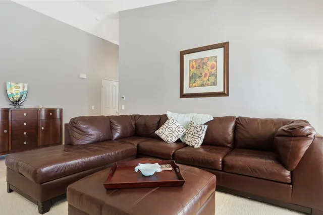 a kitchen with appliances a sink and cabinets