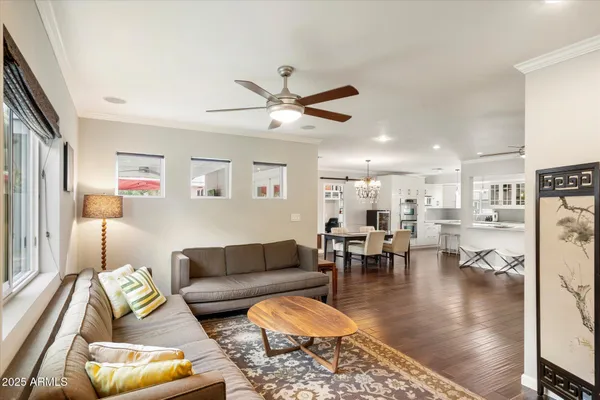 a living room with furniture and a rug