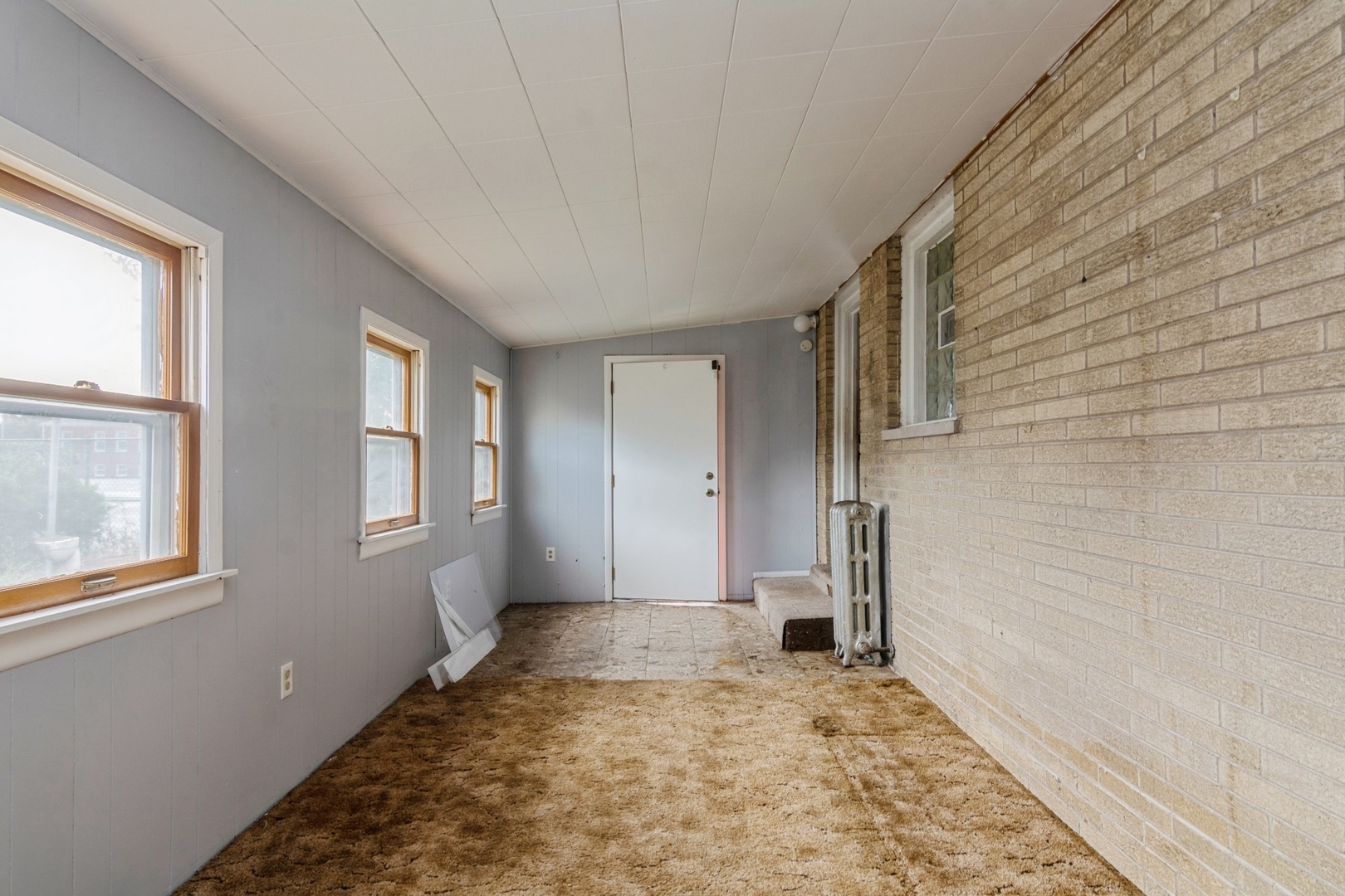 16155 Honore Avenue Markham, IL 60428 - Photo 7 of 10 a view of a room with a window