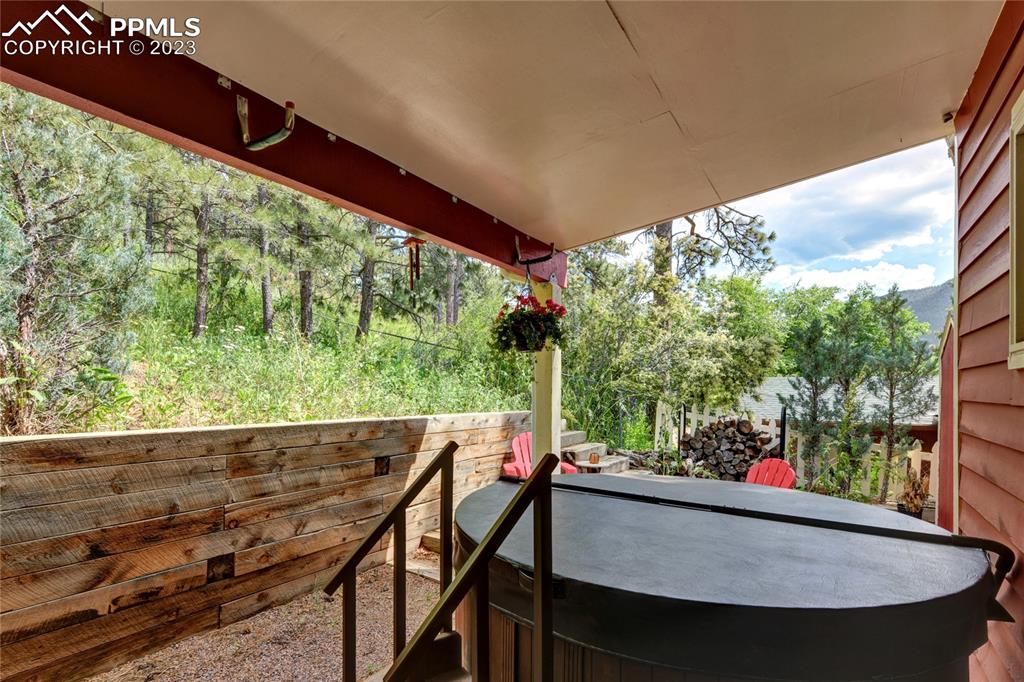 8236 Highway 24 Cascade, CO 80809 - Photo 19 of 24 a view of an outdoor dining space with furniture