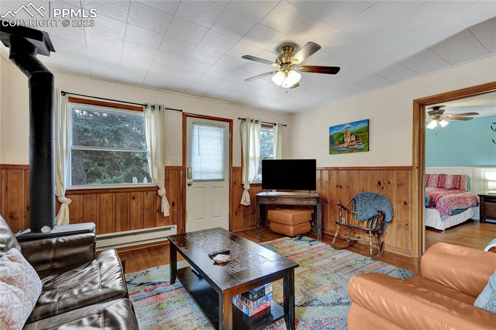 8236 Highway 24 Cascade, CO 80809 - Photo 5 of 24 a living room with furniture and a flat screen tv