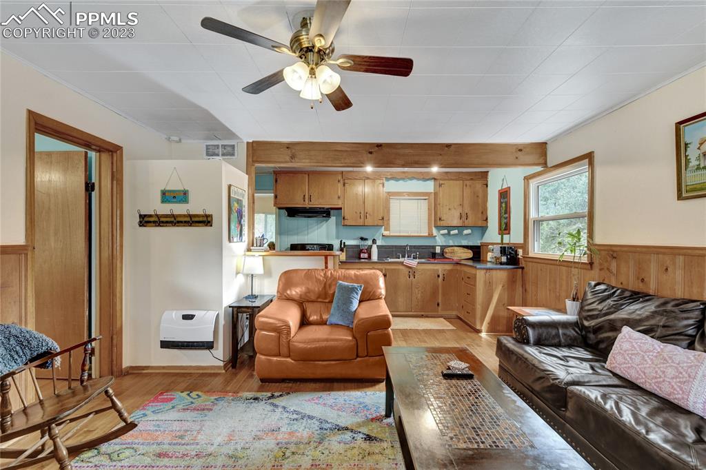 8236 Highway 24 Cascade, CO 80809 - Photo 6 of 24 a living room with furniture and kitchen view