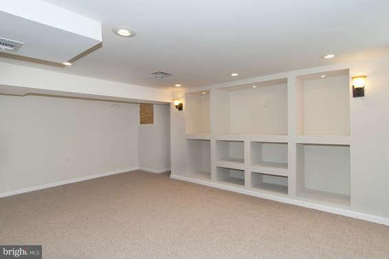 6100 Dunroming Road Baltimore, MD 21239 - Photo 15 of 21 Family Room w/Custom Entertainment Cntr