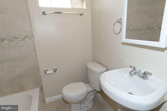 6100 Dunroming Road Baltimore, MD 21239 - Photo 17 of 21 Basement Level Bath