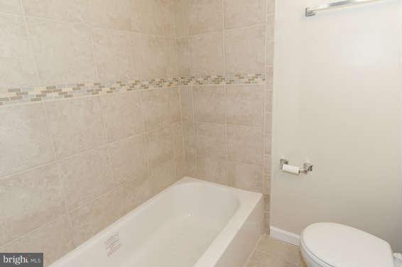 6100 Dunroming Road Baltimore, MD 21239 - Photo 18 of 21 Basement Level Bath View #2