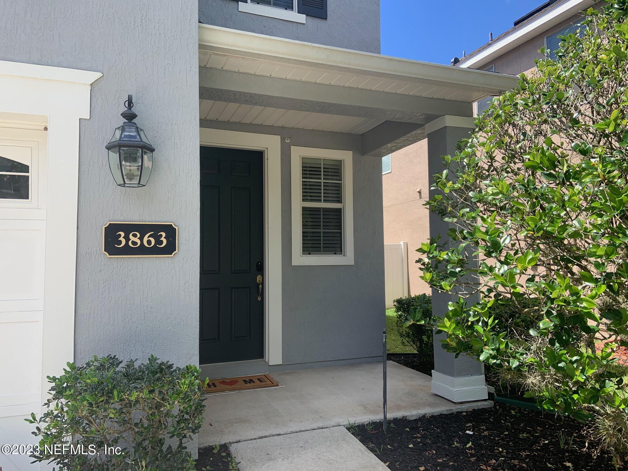 3863 Chasing Falls Road Orange Park, FL 32065 - Photo 2 of 32 a view of a entryway door of the house