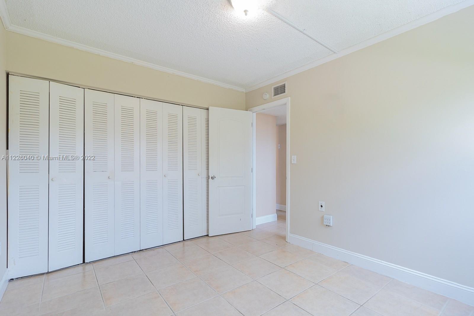 10897 Northwest 7th Street, Unit 1429 Miami, FL 33172 - Photo 12 of 17 a view of an empty room