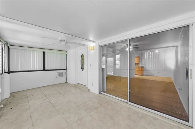 a view of a swimming pool with outdoor seating