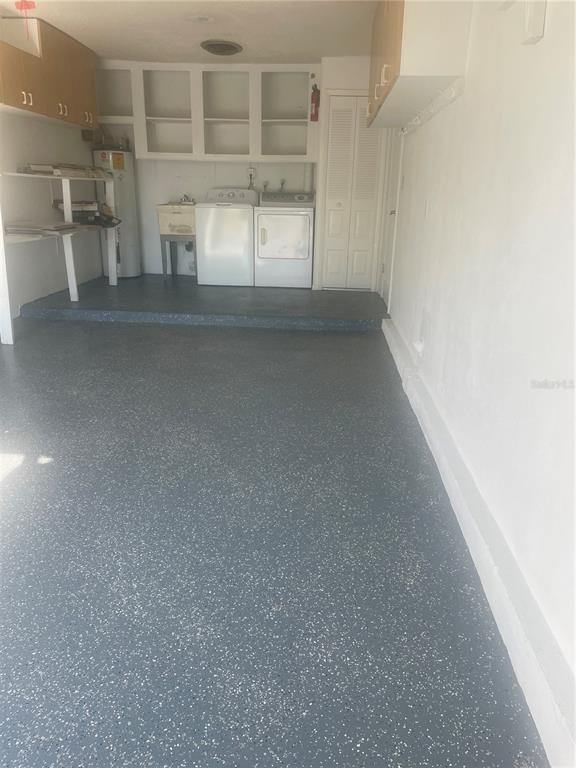 2836 Highlands Boulevard, Unit A Palm Harbor, FL 34684 - Photo 32 of 95 a view of a room with rack on the wall