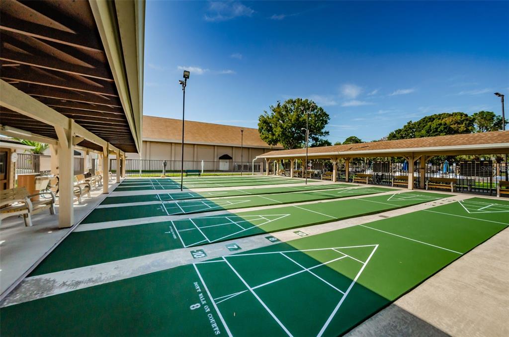 2836 Highlands Boulevard, Unit A Palm Harbor, FL 34684 - Photo 69 of 95 a view of tennis court with houses in it