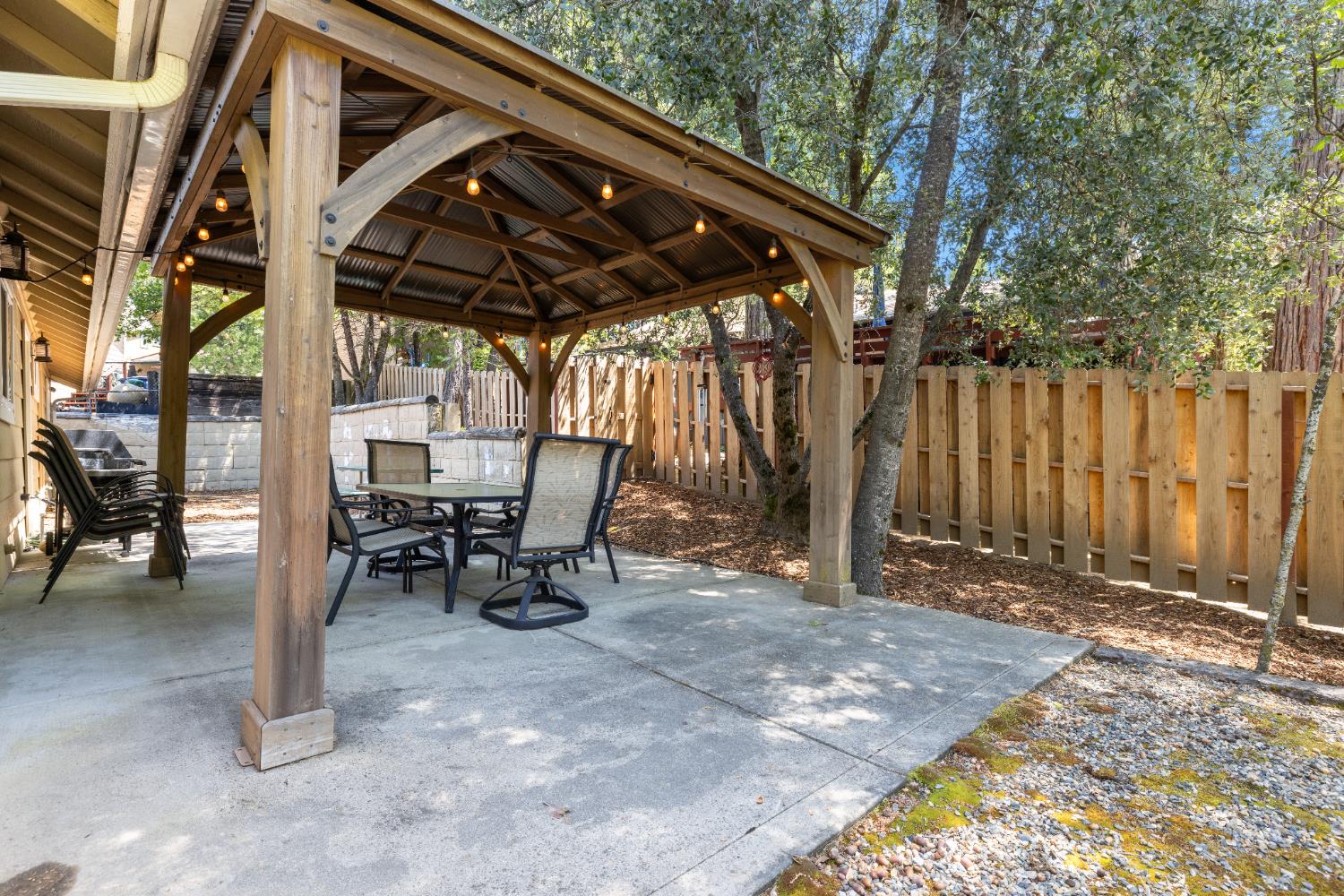39398 Robin Bass Lake, CA 93604 - Photo 23 of 31 a view of outdoor space with table and chairs