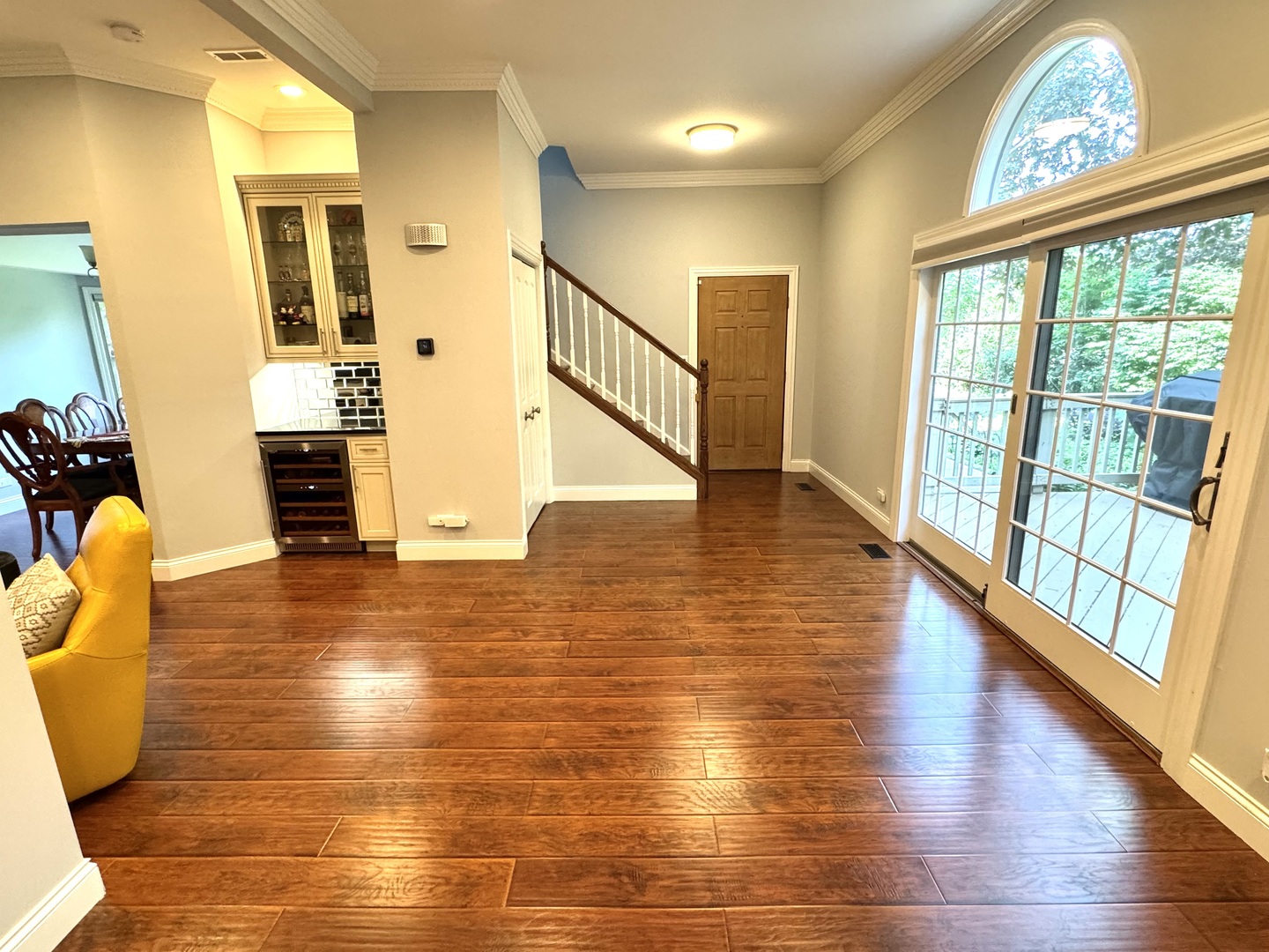 1009 Arbor Court Mount Prospect, IL 60056 - Photo 13 of 35 a view of an entryway wooden floor and a chandelier