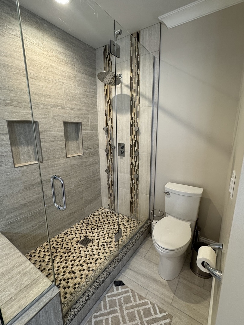 1009 Arbor Court Mount Prospect, IL 60056 - Photo 21 of 35 a bathroom with a toilet and a shower