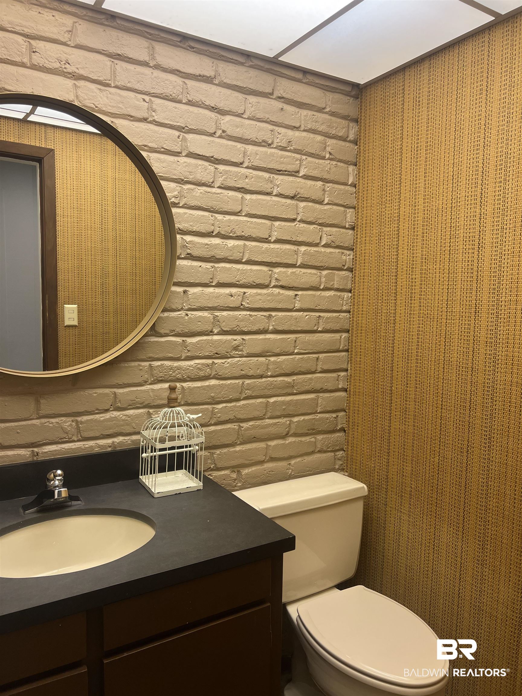 15 Spring Bank Road Mobile, AL 36608 - Photo 49 of 58 Bathroom featuring vanity and brick wall