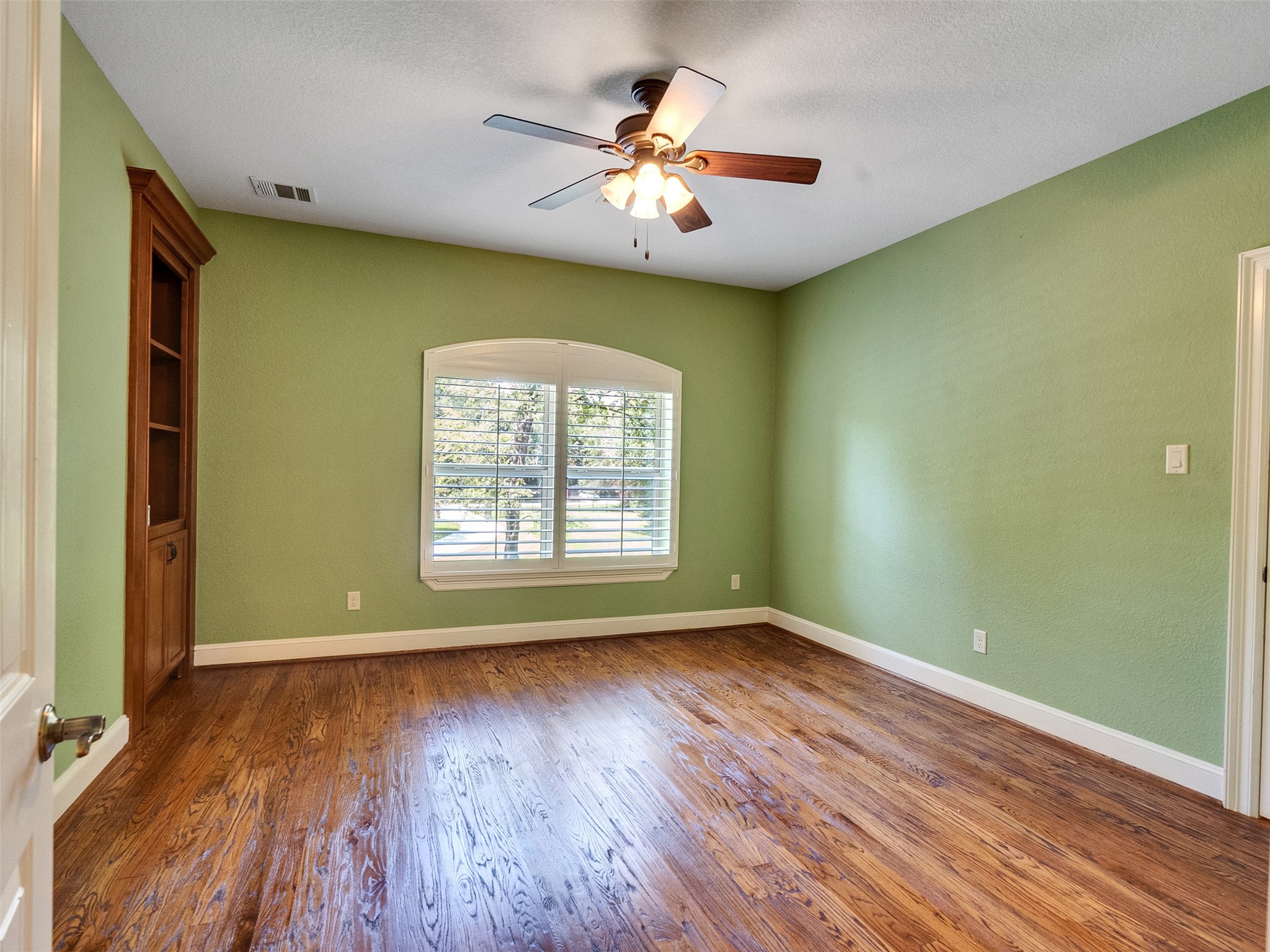 28503 Champions Ridge Road Magnolia, TX 77354 - Photo 32 of 47 Upstairs, the third bedroom is generously sized and features a hidden secret room, perfect for a play area, office, or private retreat.