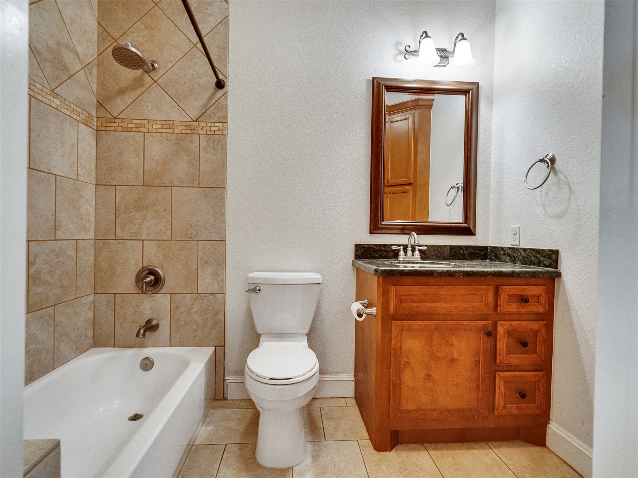 28503 Champions Ridge Road Magnolia, TX 77354 - Photo 35 of 47 The third bedroom has a nearby full bathroom, combining style and functionality for added comfort.