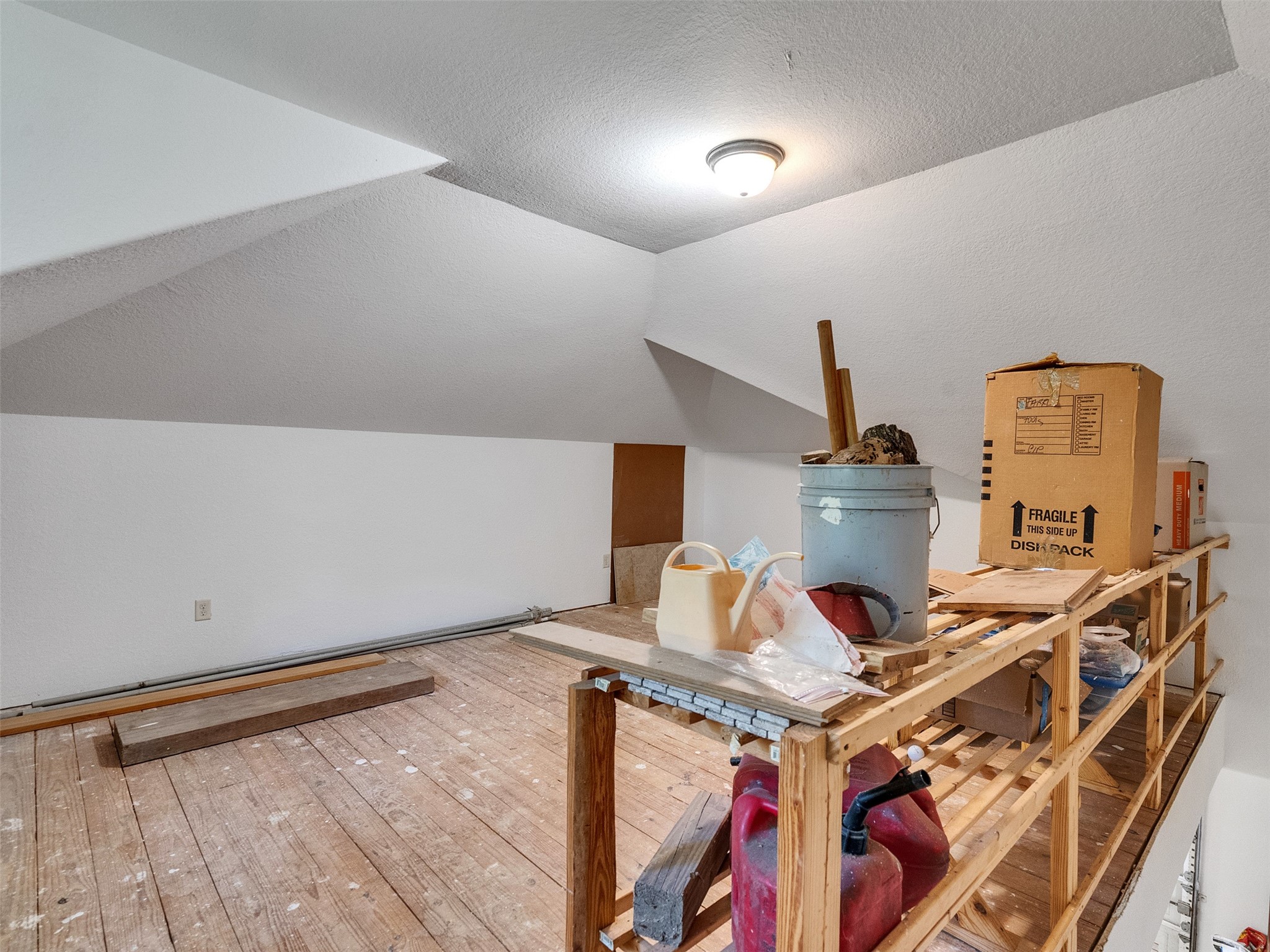 28503 Champions Ridge Road Magnolia, TX 77354 - Photo 39 of 47 The staircase leads to a versatile space above the garage, perfect for a work or hobby room.