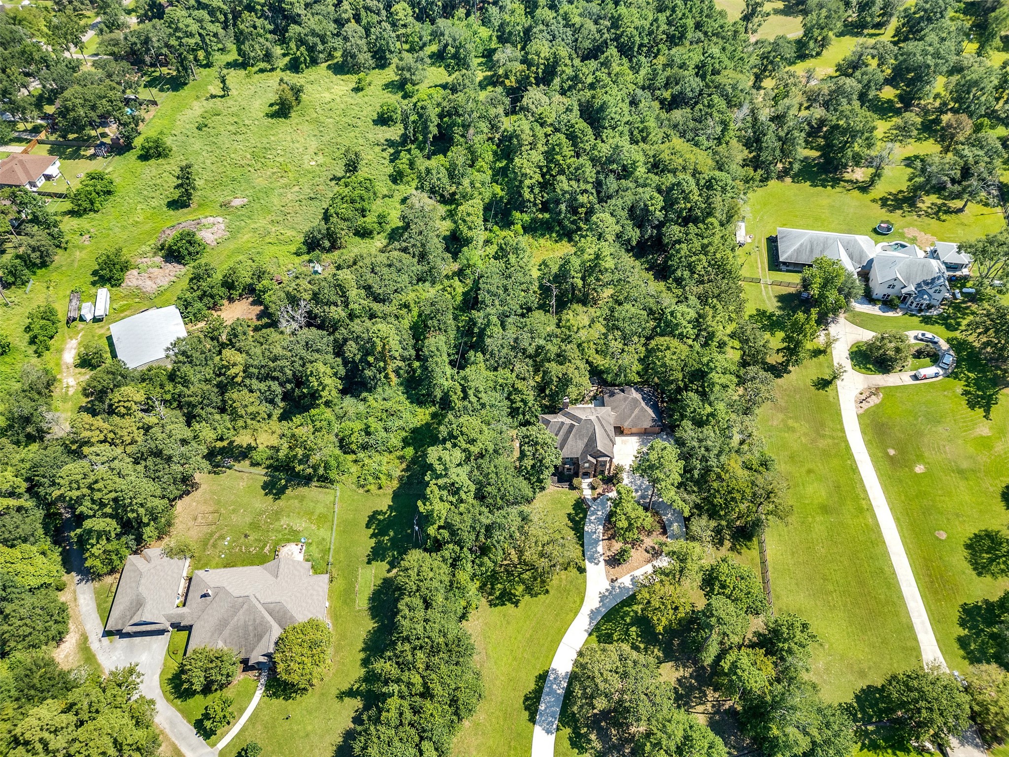 28503 Champions Ridge Road Magnolia, TX 77354 - Photo 44 of 47 This home is nestled on 5 acres, offering plenty of space and privacy