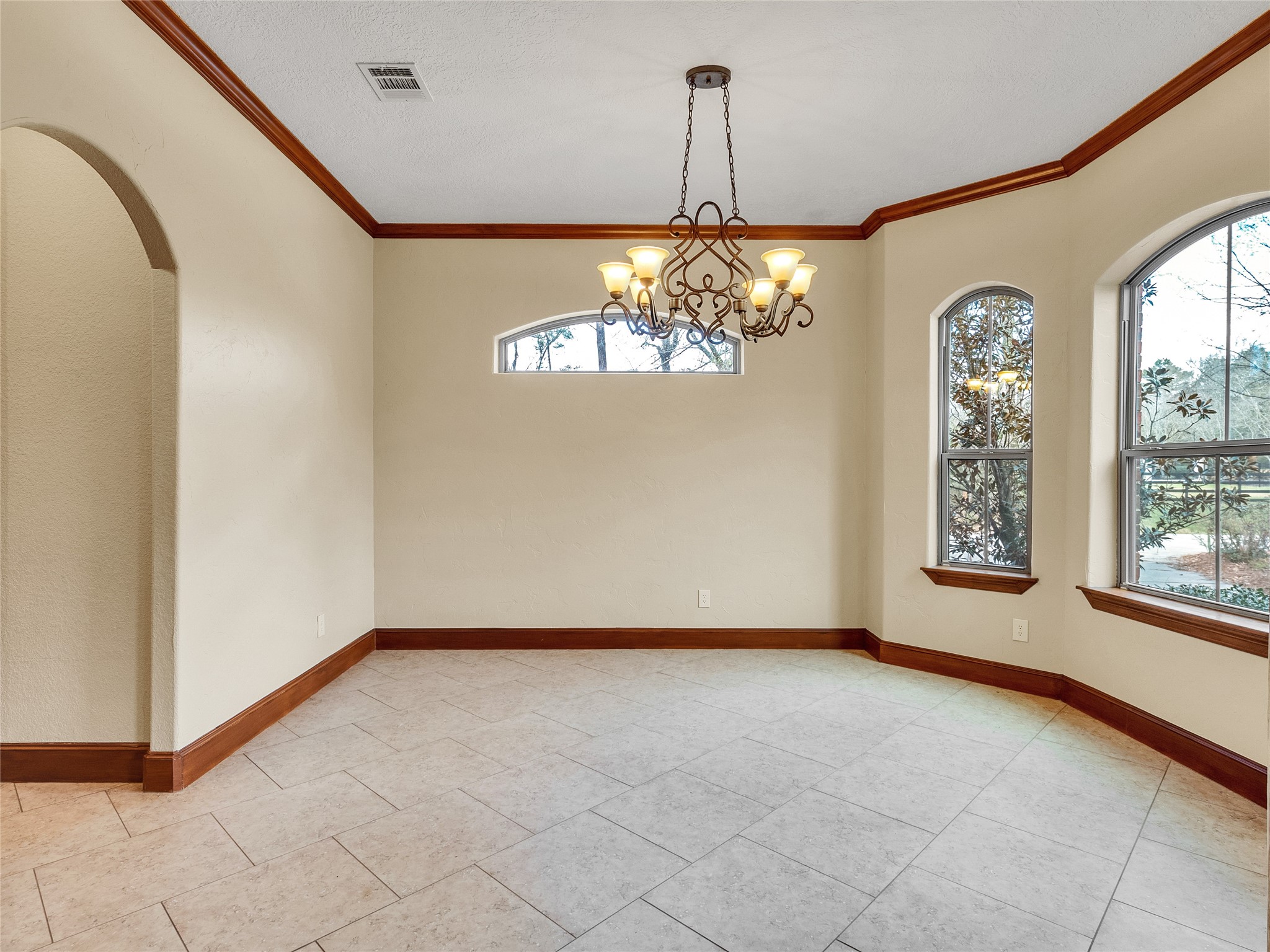 28503 Champions Ridge Road Magnolia, TX 77354 - Photo 5 of 47 Enjoy a freshly painted dining room, perfect for hosting family dinners and entertaining guests.