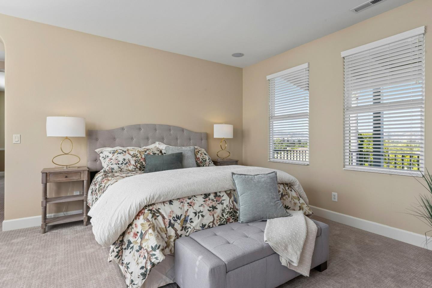 7466 Dunbar Court Gilroy, CA 95020 - Photo 48 of 103 a bed sitting in a bedroom next to a window