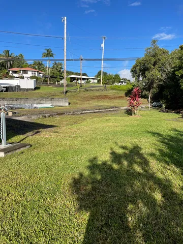 a view of a large building with a big yard