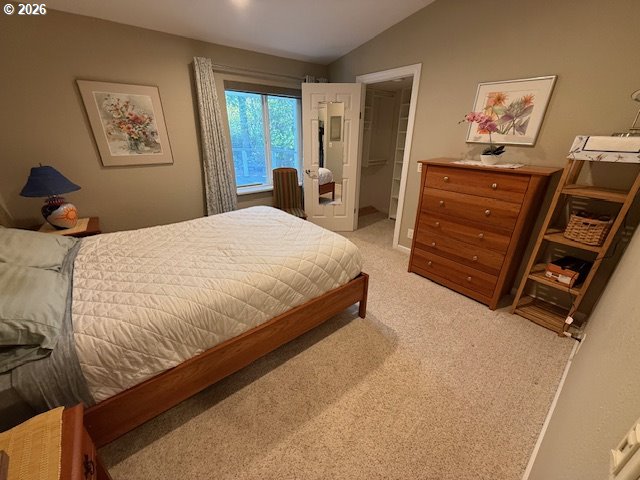 212 Munsel Creek Loop Florence, OR 97439 - Photo 5 of 6 a bedroom with a bed and furniture with window