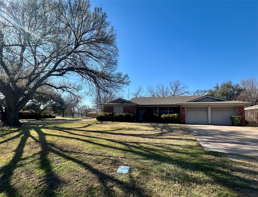 406 Northwest 5th Street Hubbard, TX 76648 - Photo 40 of 40 a view of a house with a yard