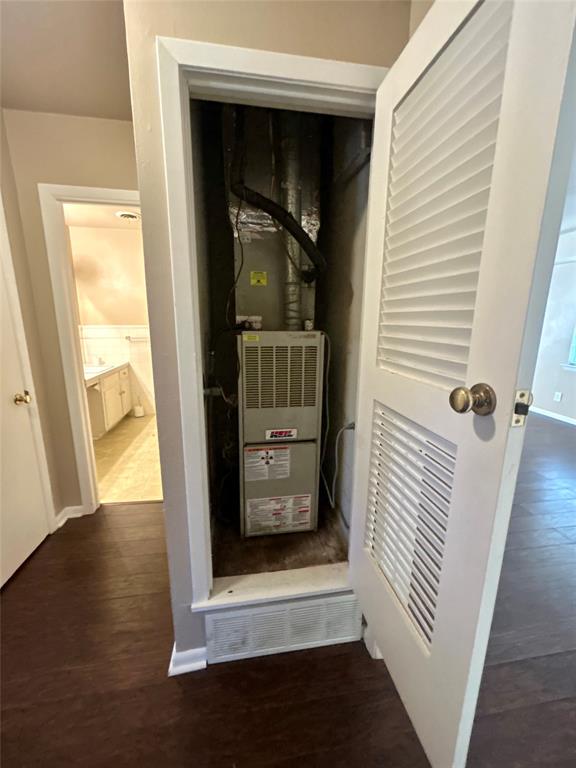 406 Northwest 5th Street Hubbard, TX 76648 - Photo 10 of 40 a view of a hallway with wooden floor and stairs