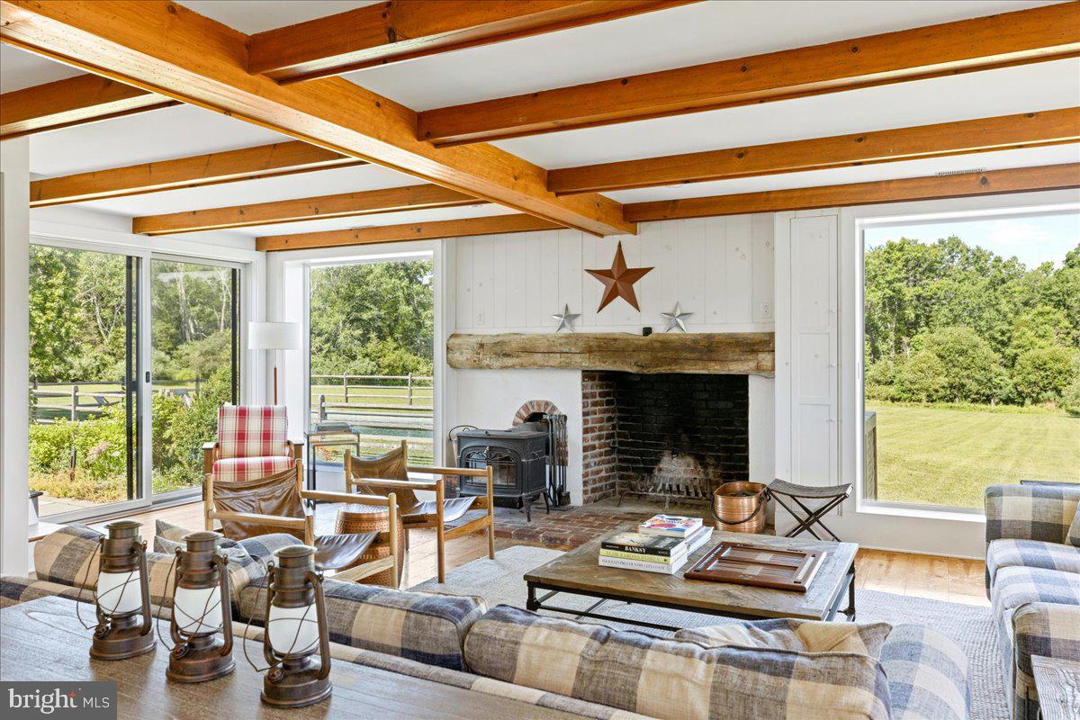 481 Quarry Road Ottsville, PA 18942 - Photo 16 of 64 a living room with furniture and fireplace